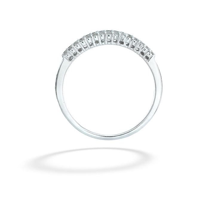 Silver ring with small diamonds on a white background Emerald and Round Cut Diamond Band