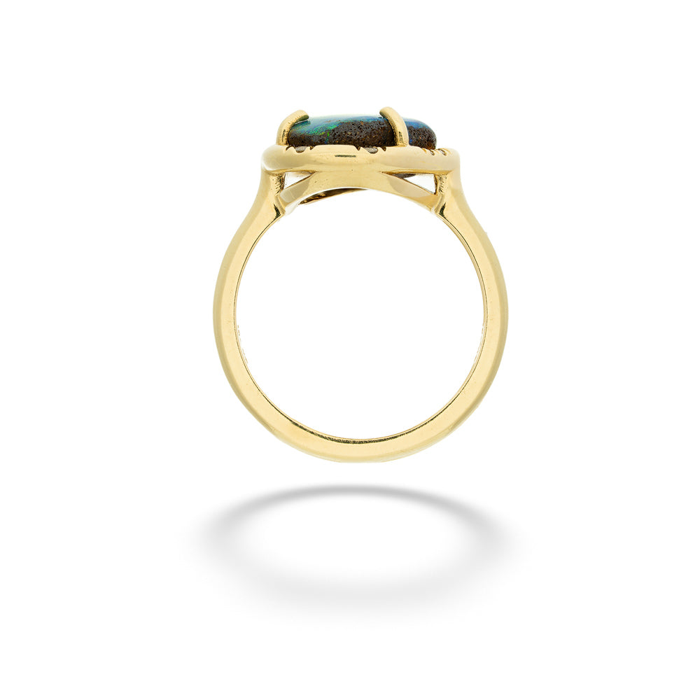 Gold ring with a green stone on a white background Abstract Boulder Opal and Diamond Sprinkle Ring by Lauren K.