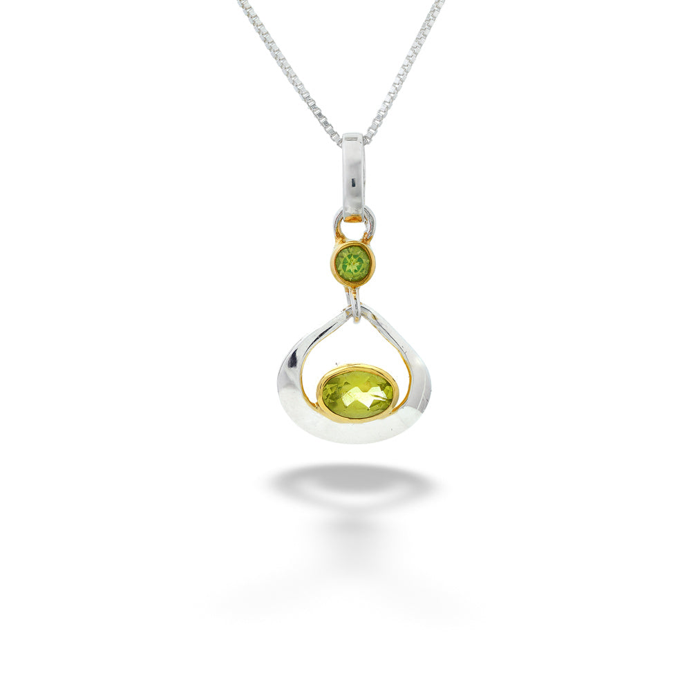 Teardrop-shaped pendant with green gemstone on a white background Peridot Pendant Necklace by Michou