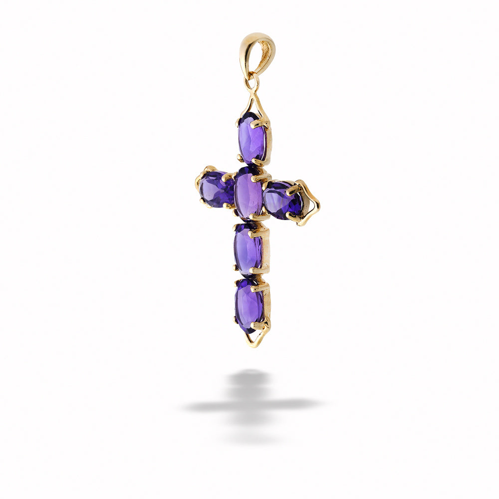 Gold pendant with purple gemstones on a white background Amethyst Cross Pendant 
