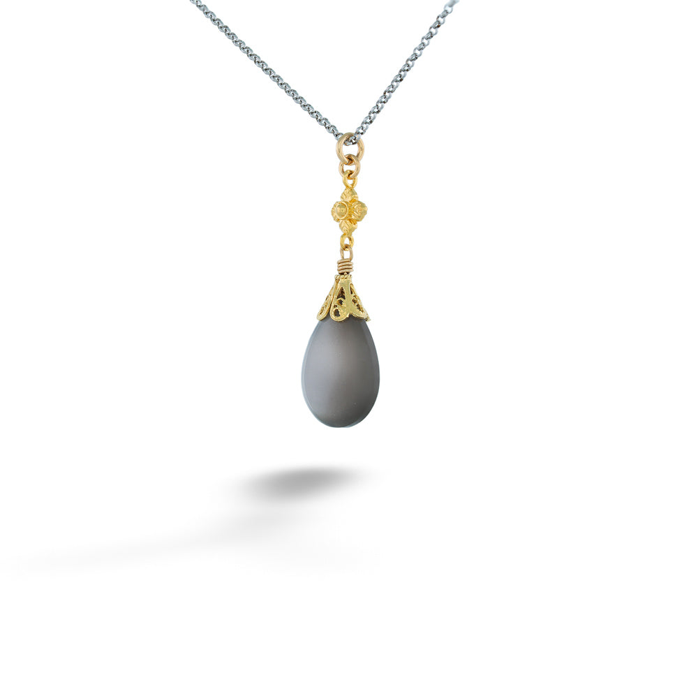 Necklace with a gray teardrop pendant and gold accent on a white background Gray Moonstone Drop Pendant Necklace by Anatoli