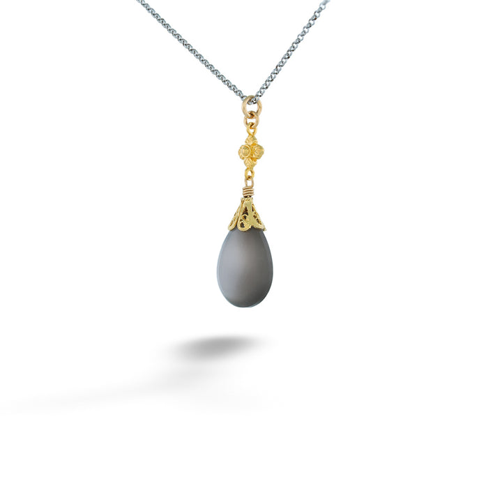 Necklace with a gray teardrop pendant and gold accent on a white background Gray Moonstone Drop Pendant Necklace by Anatoli