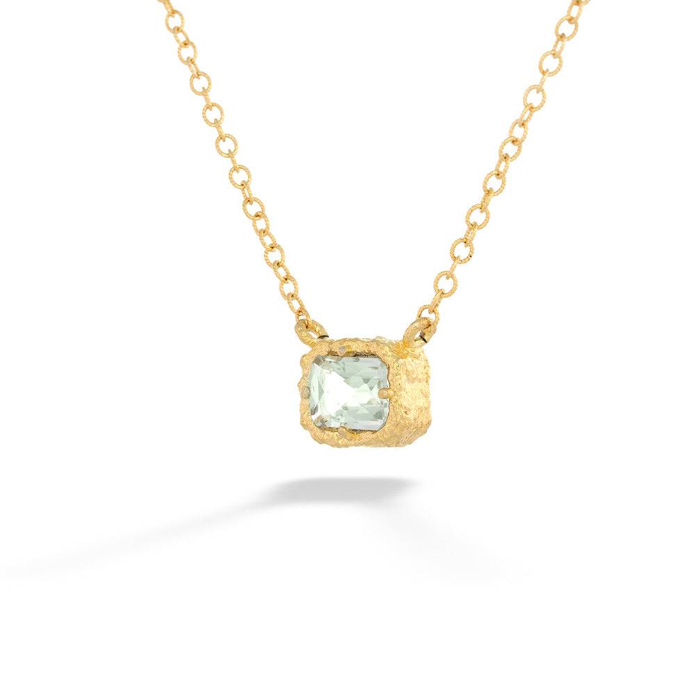 Gold necklace with a green gemstone pendant on a white background Green Amethyst Necklace by Anatoli
