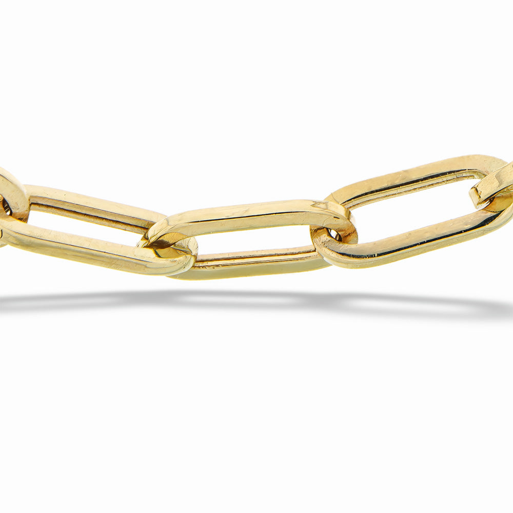 Gold chain bracelet on a white background  Gold Paperclip Chain Necklace by Gabriel & Co. 