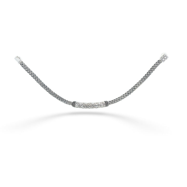 Silver chain bracelet on a white background Tulang Naga Bar Bracelet with Black Spinel by Samuel B.