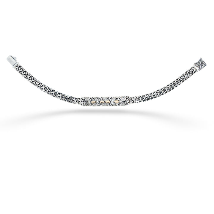 Silver chain bracelet on a white background Filigree Bar Bracelet with White Topaz by Samuel B.