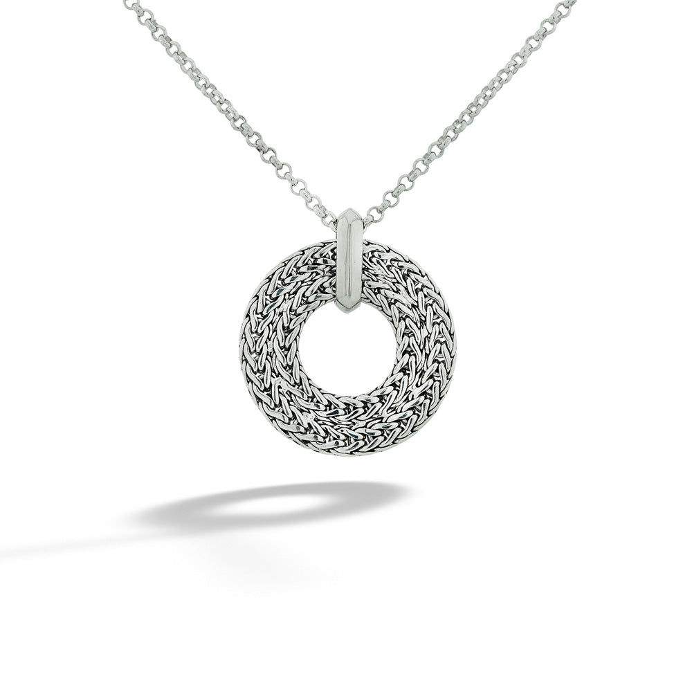 Silver braided necklace on a white background  Icon Link Round Pendant Necklace by John Hardy 