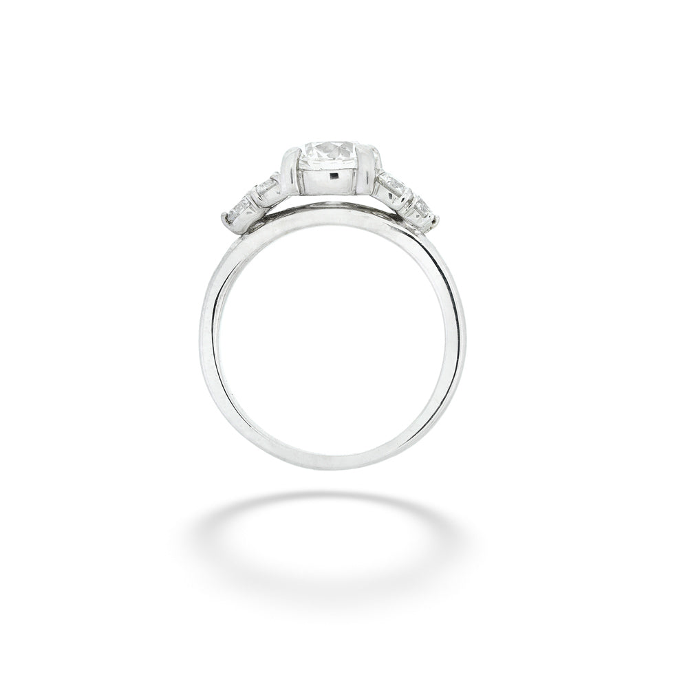 Silver ring with diamond accents on a white background 18K White Gold Diamond Bridal Ring
