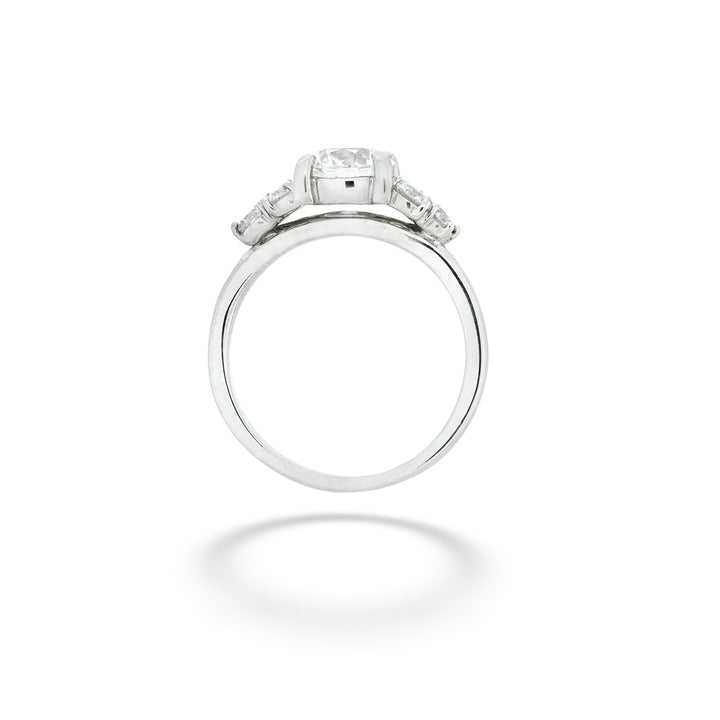 Silver ring with diamond accents on a white background 18K White Gold Diamond Bridal Ring