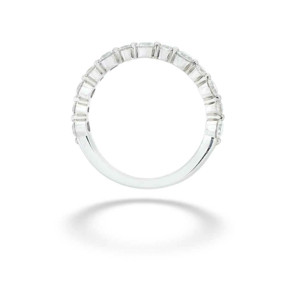 Silver ring with baguette-cut diamonds on a white background 18K White Gold Diamond Wedding Band