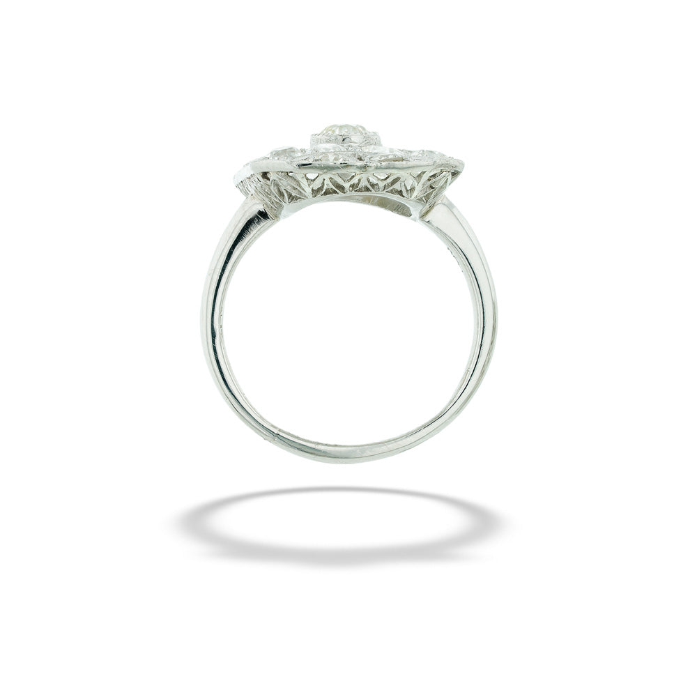 Silver ring with a diamond-like center on a white background Art Deco Diamond Filigree Ring