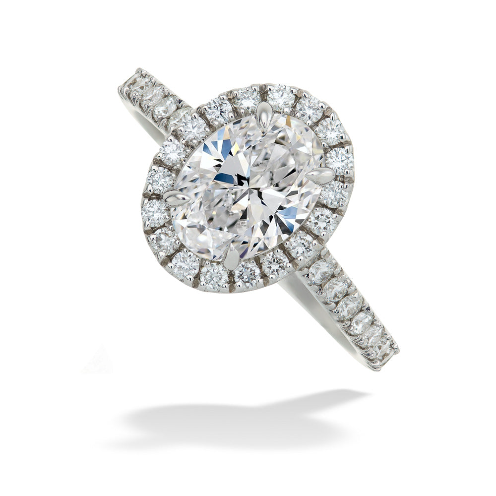 Oval Center & Melee Diamond Engagement Ring
