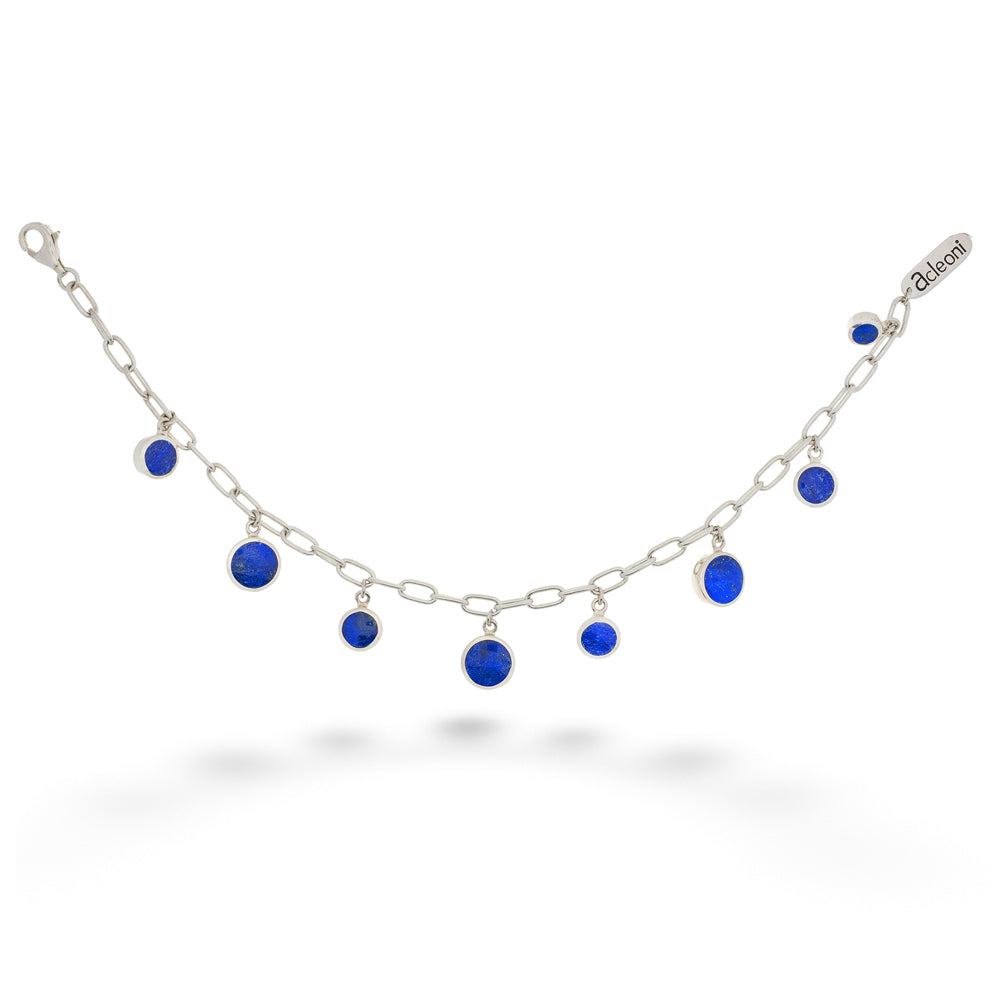 Silver necklace with blue stones on a white background Turquoise &amp; Lapis Reversible Bracelet by Acleoni 