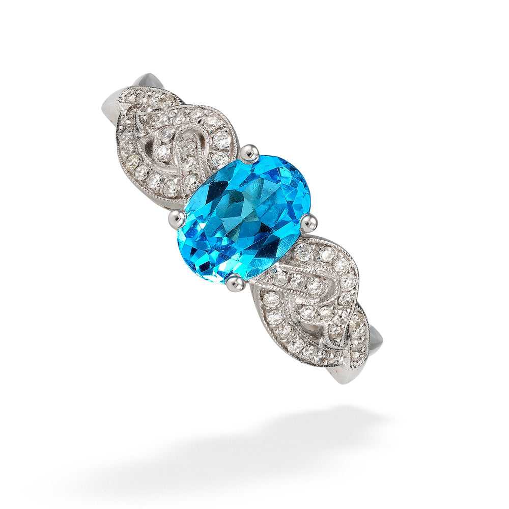 Oval Blue Topaz and Diamond Ring